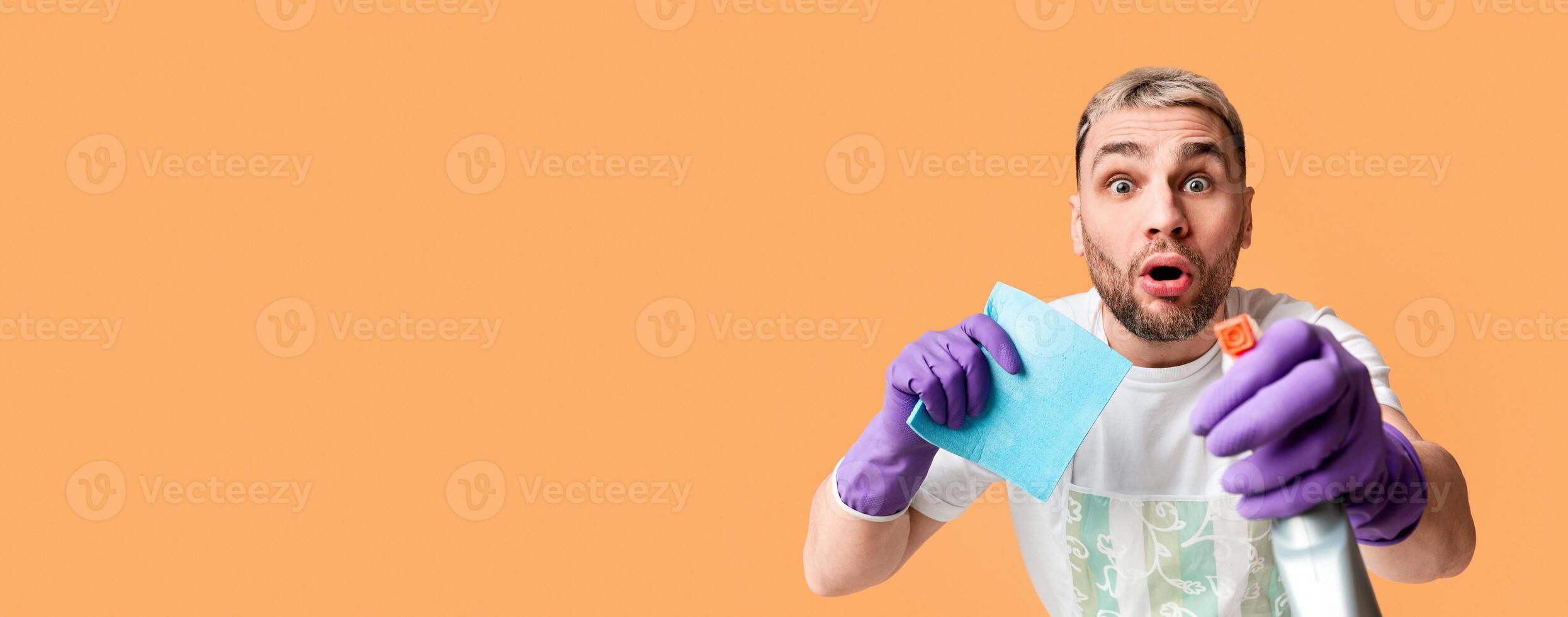 Man wipes the screen with spray and napkin, free space photo