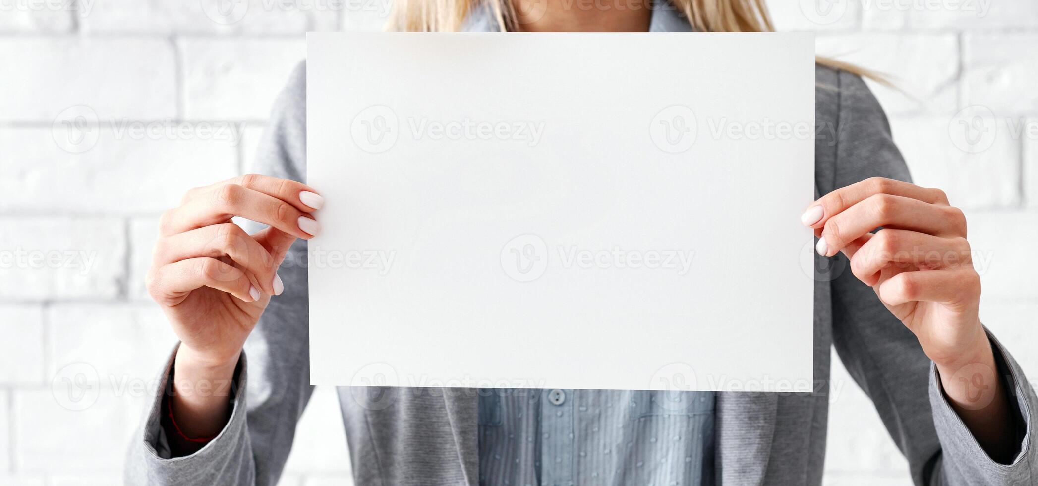 Girl at home holding paper with inscription. Stay safe, coronavirus COVID-19, work from home photo