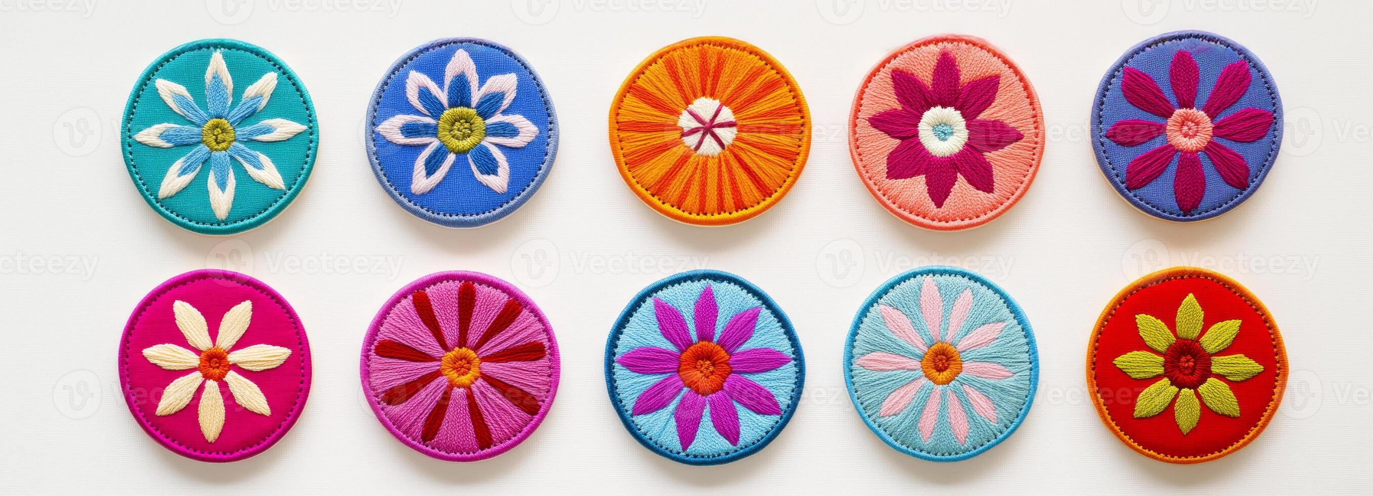 A colorful collection of round embroidered floral patches, each with vibrant, unique designs photo