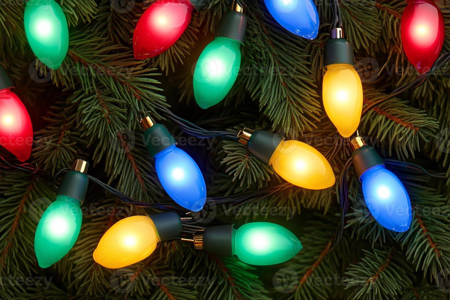 Colorful Christmas lights entwined in evergreen branches create a festive atmosphere for holiday celebrations photo