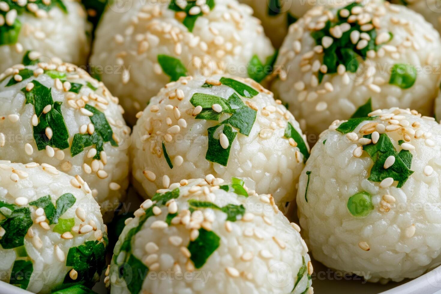Close-up of vibrant green rice balls adorned with sesame and fresh herbs in an oriental setting photo