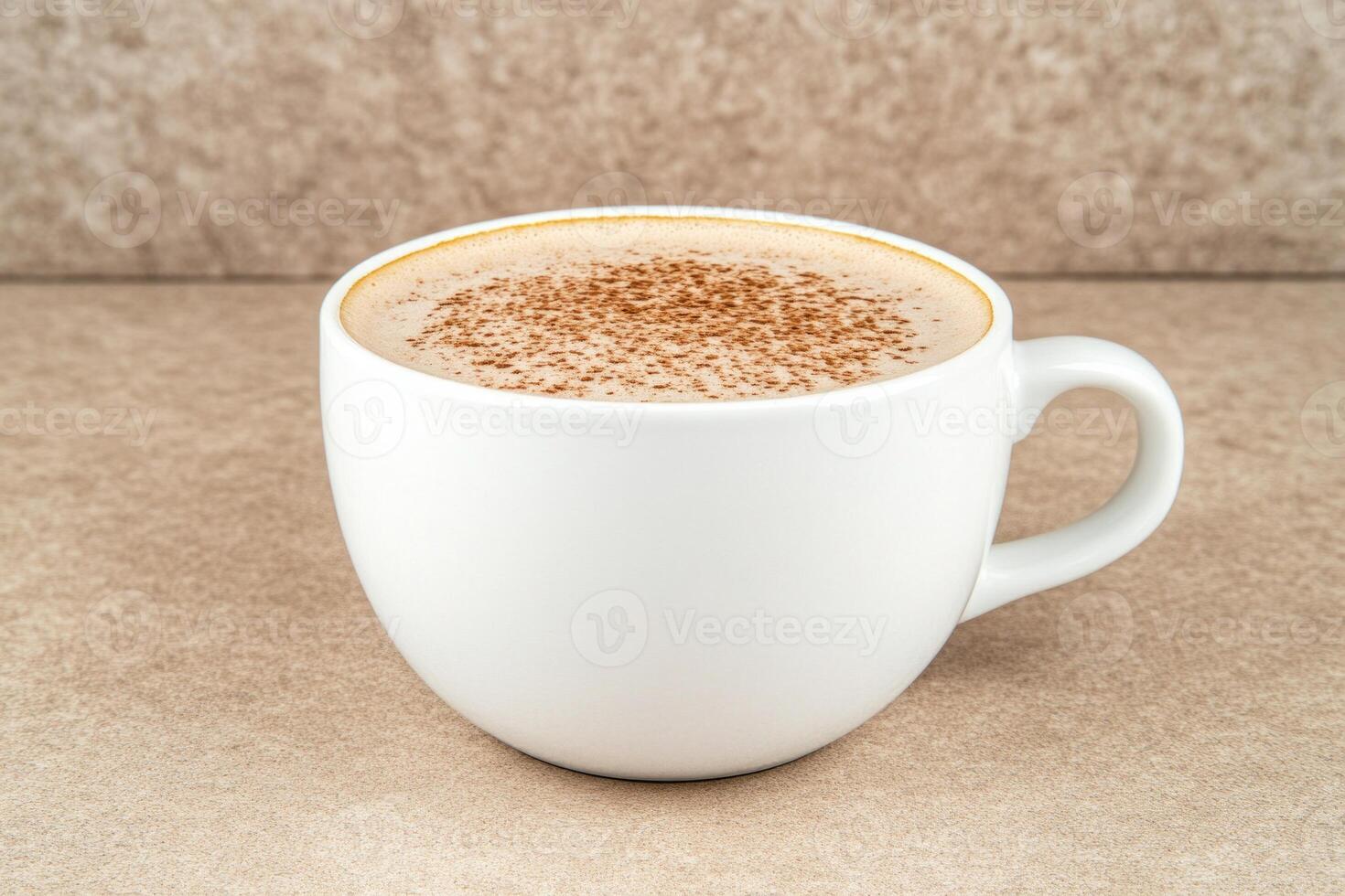 Enjoy a warm cup of steaming coffee with rich foam on a cozy beige table setting photo