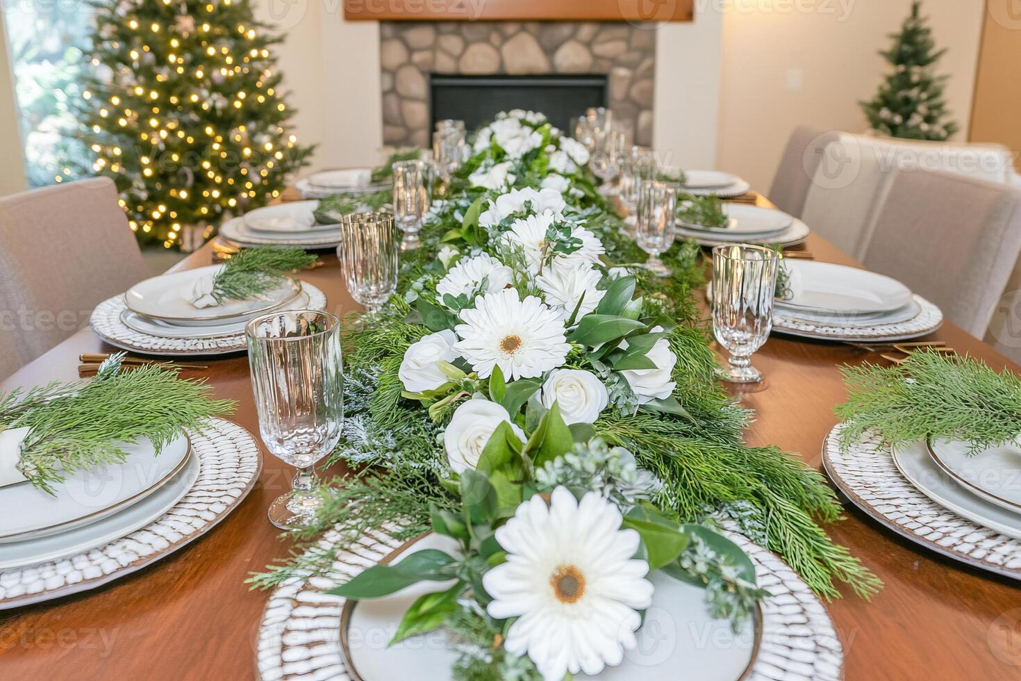 Cozy farmhouse dining table decorated with fresh greenery and earthy tones for an inviting gathering atmosphere photo