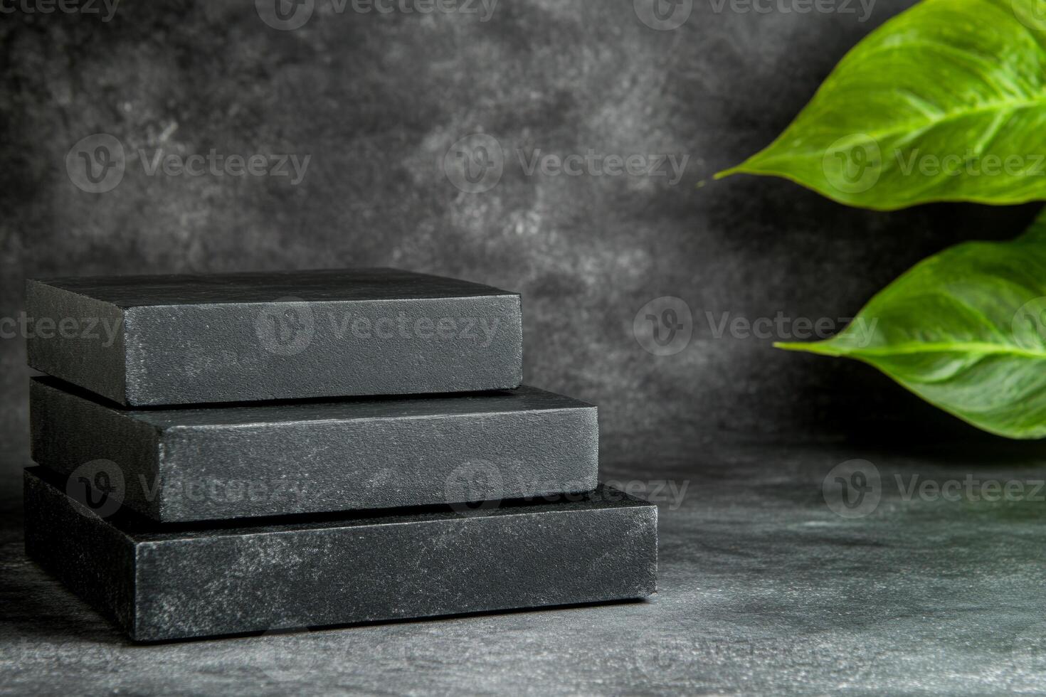 Minimalist podium mockups featuring black cubic platforms against a dark backdrop with dramatic lighting effects photo