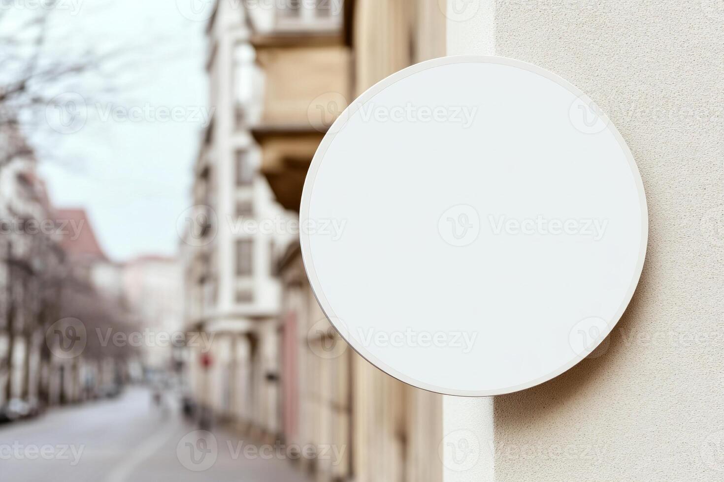 Minimalist round outdoor signage mockup in morning light on a quiet street corner photo