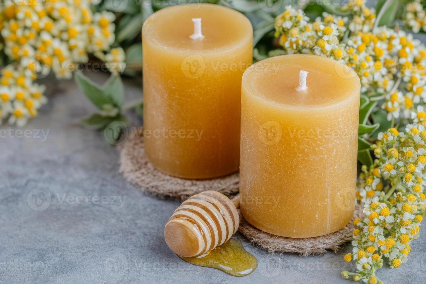 Close-up of organic beeswax candles with honey and herbs on a rustic table in warm tones photo