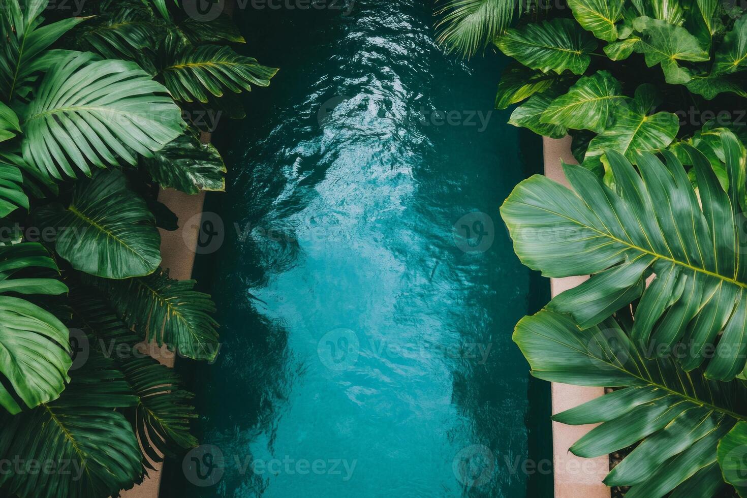 A tranquil poolside oasis surrounded by tropical plants at a beach resort in a secluded area photo