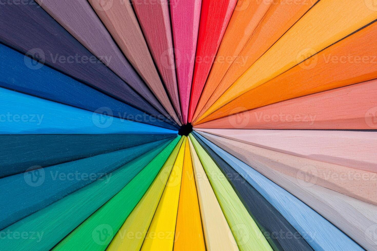 Color pencils beautifully arranged in a circular pattern showcasing vibrant hues and textures photo