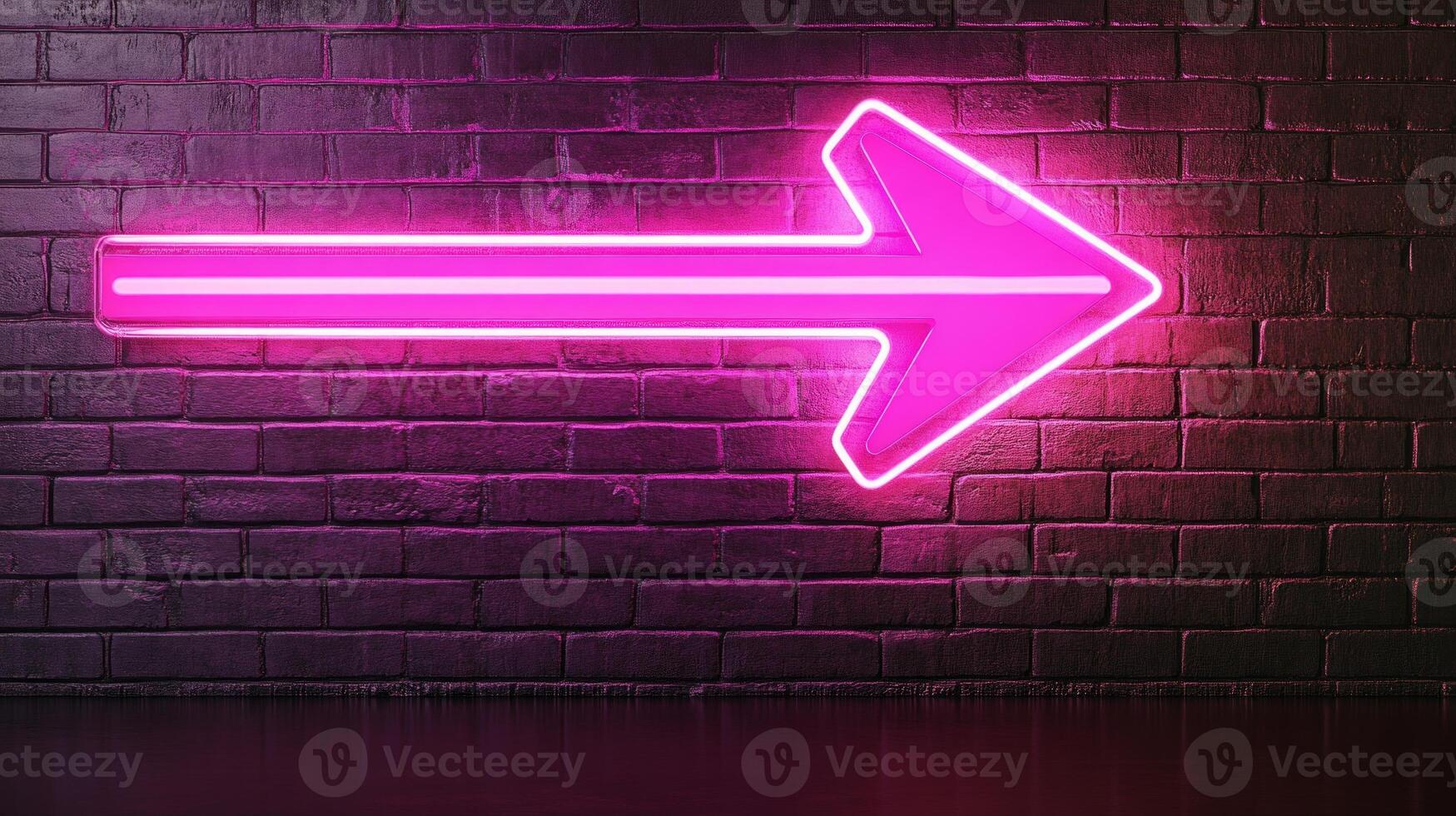 Futuristic neon pink arrow sign glowing brightly against a dark wall, symbolizing progress and direction photo