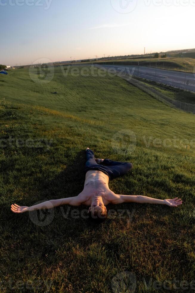 Summer activity and energy. Ballet dancer. Handsome man workout and stretching. photo
