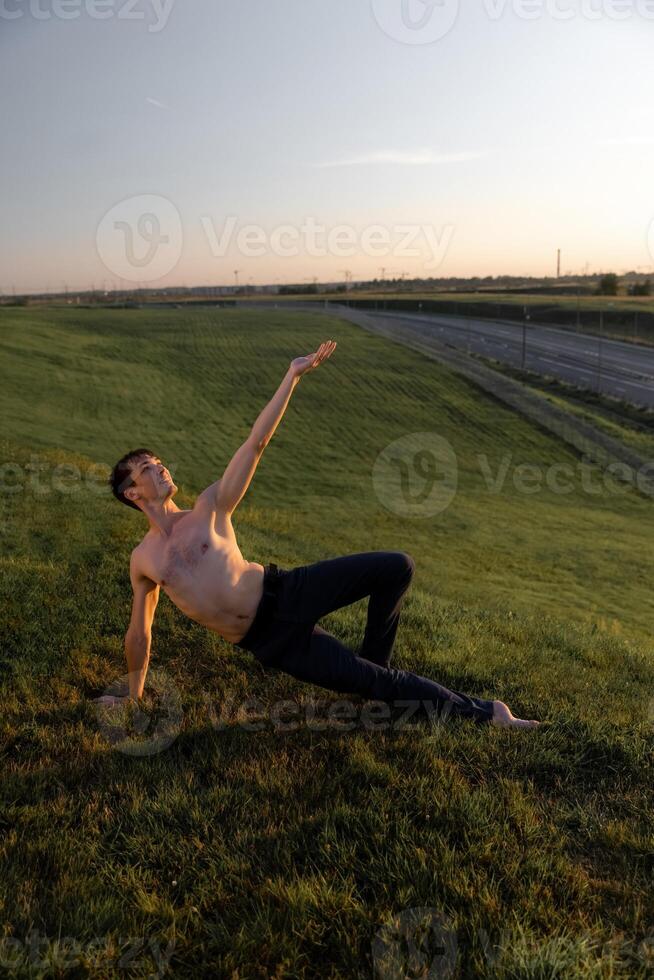 Summer activity and energy. Ballet dancer. Handsome man workout and stretching. photo