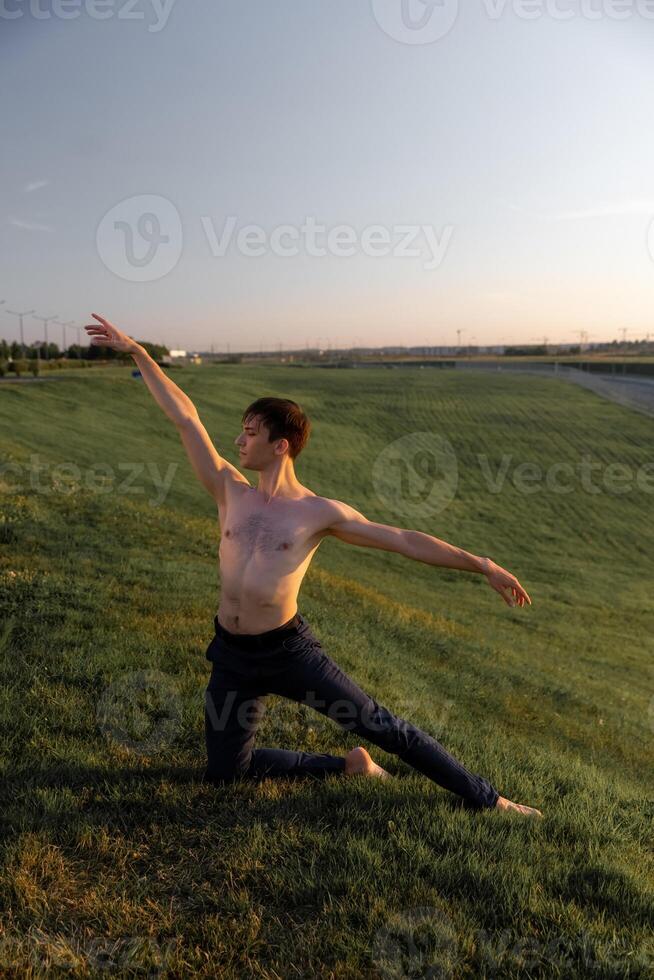 Summer activity and energy. Ballet dancer. Handsome man workout and stretching. photo