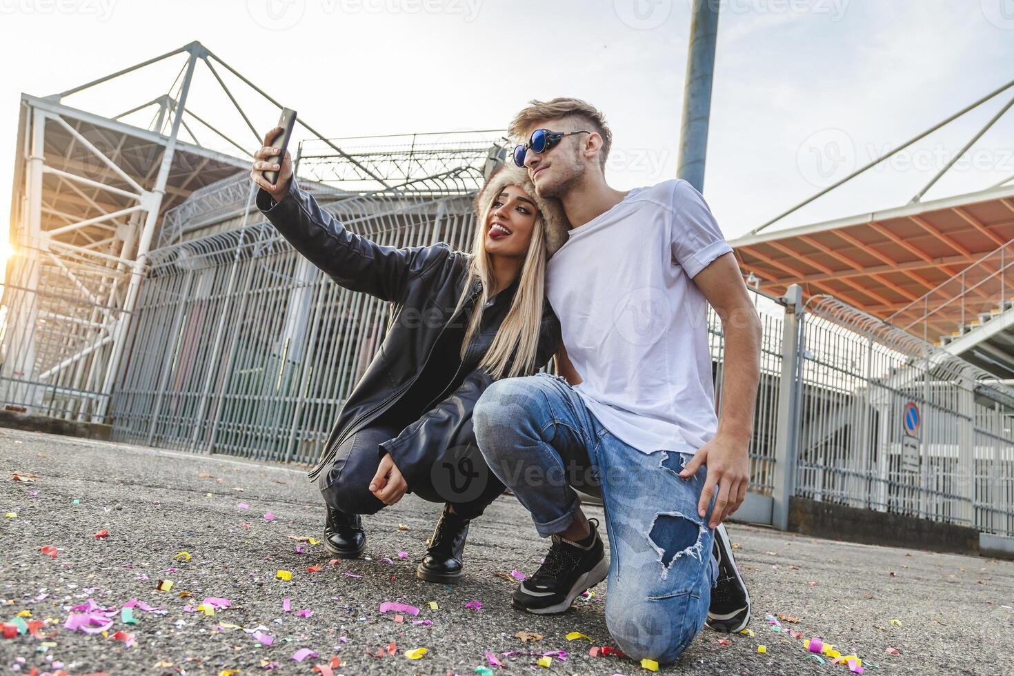couple of young beautiful lovers take a selfie on the large square photo