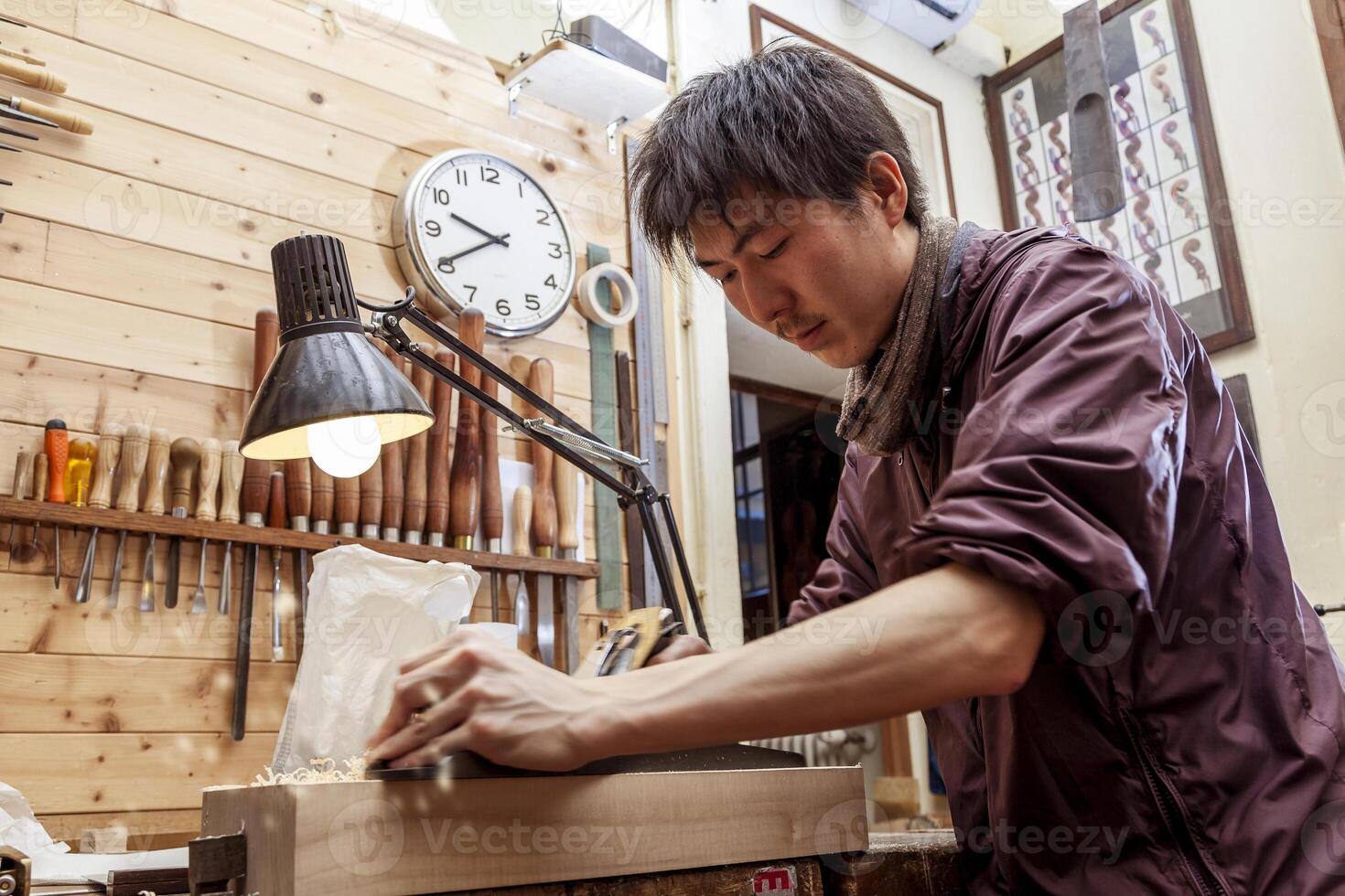 craftsman japaneese violinmaker began working on a new violin photo