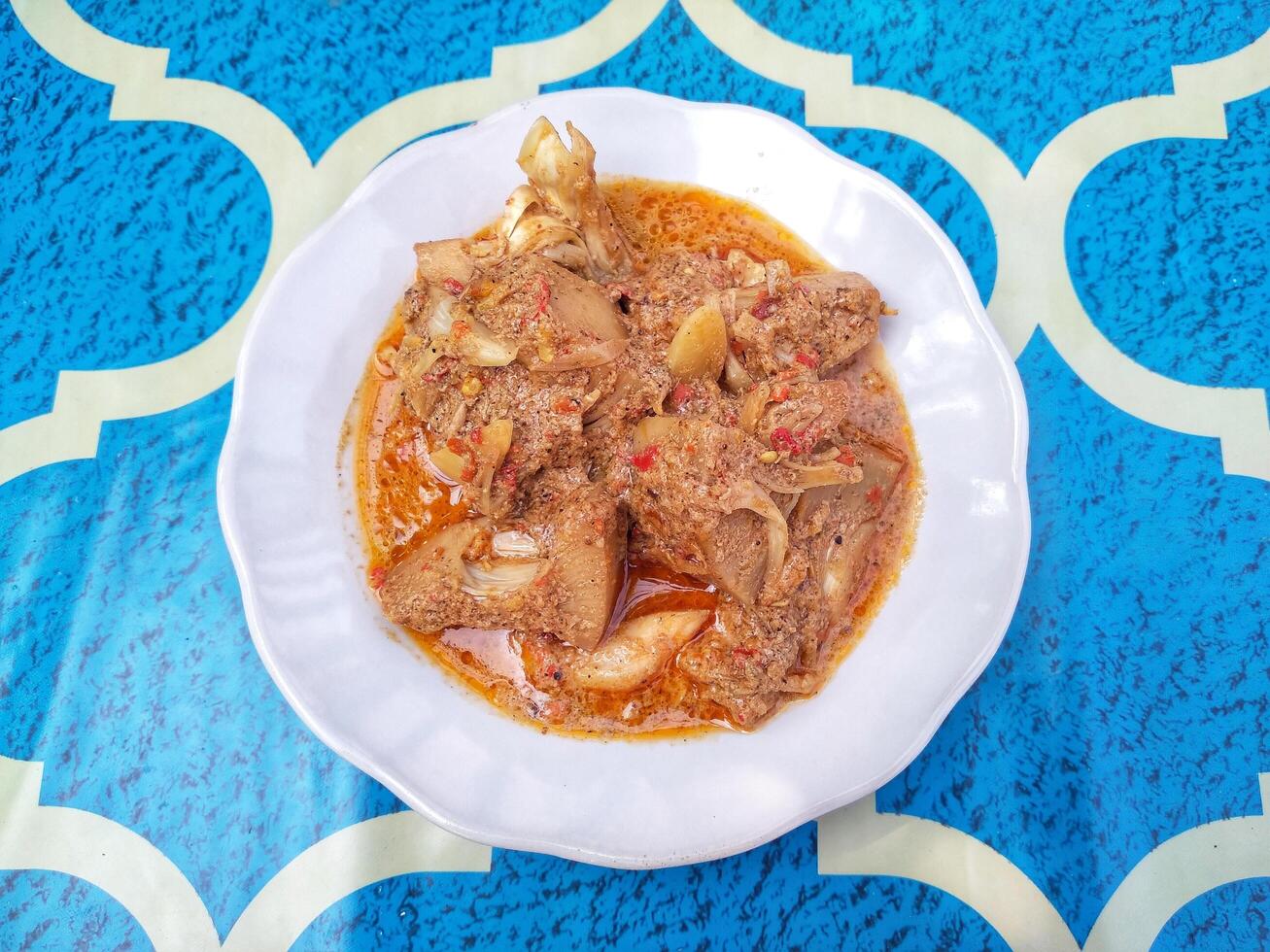 Padang Jackfruit Curry is one of the dishes that must be enjoyed when going to a Padang restaurant. The characteristic of the jackfruit curry is the thick color. photo