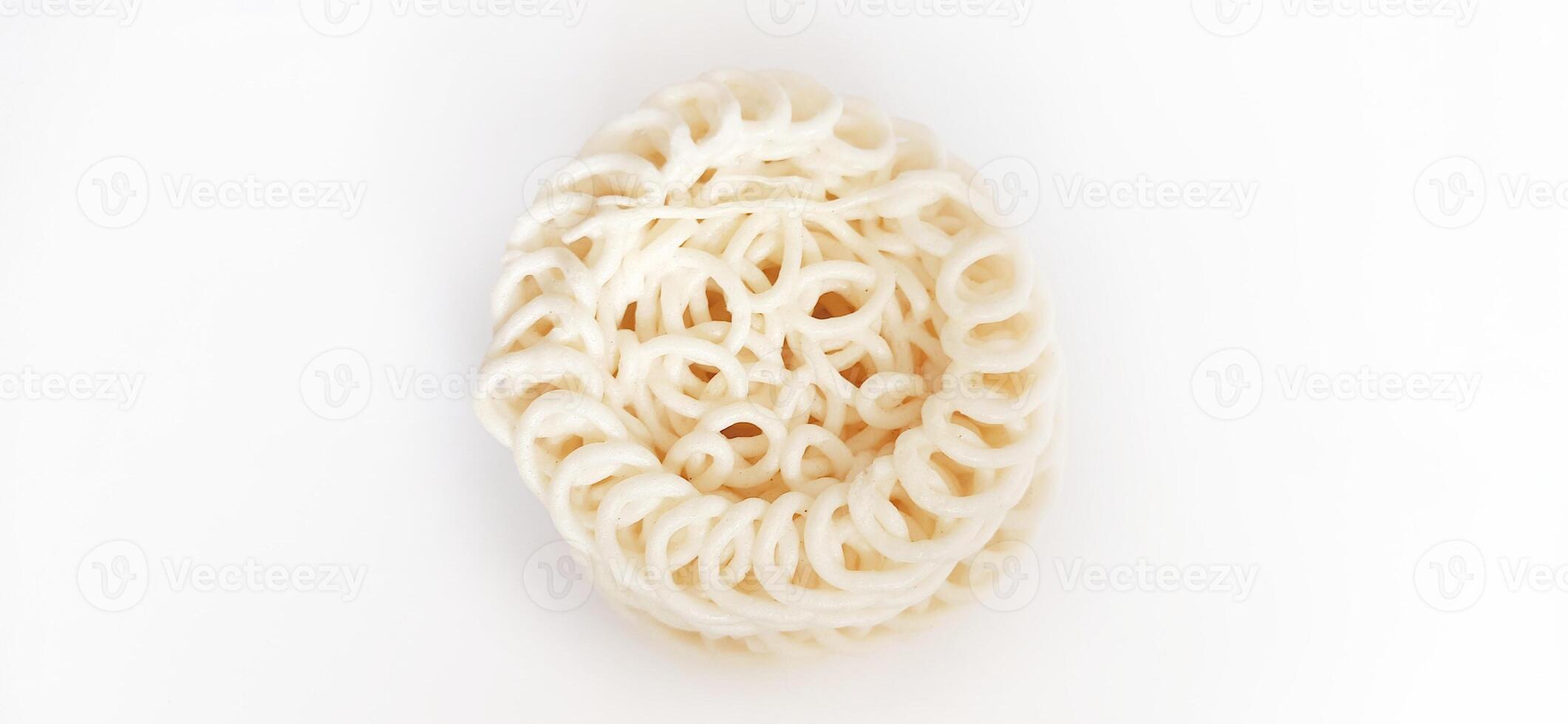White noodle crackers or kerupuk putih or kerupuk warung made from tapioca flour, snack food from Indonesia isolated on white background photo