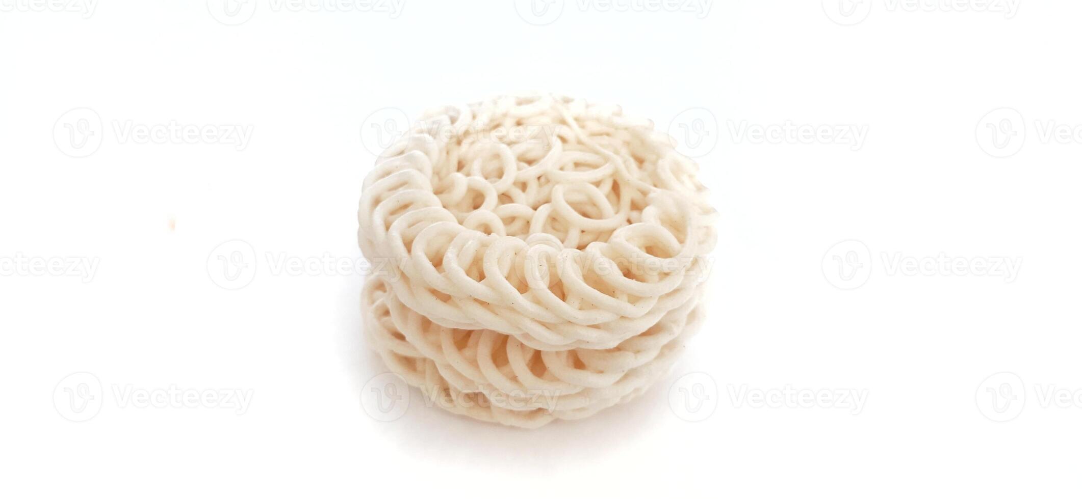 White noodle crackers or kerupuk putih or kerupuk warung made from tapioca flour, snack food from Indonesia isolated on white background photo