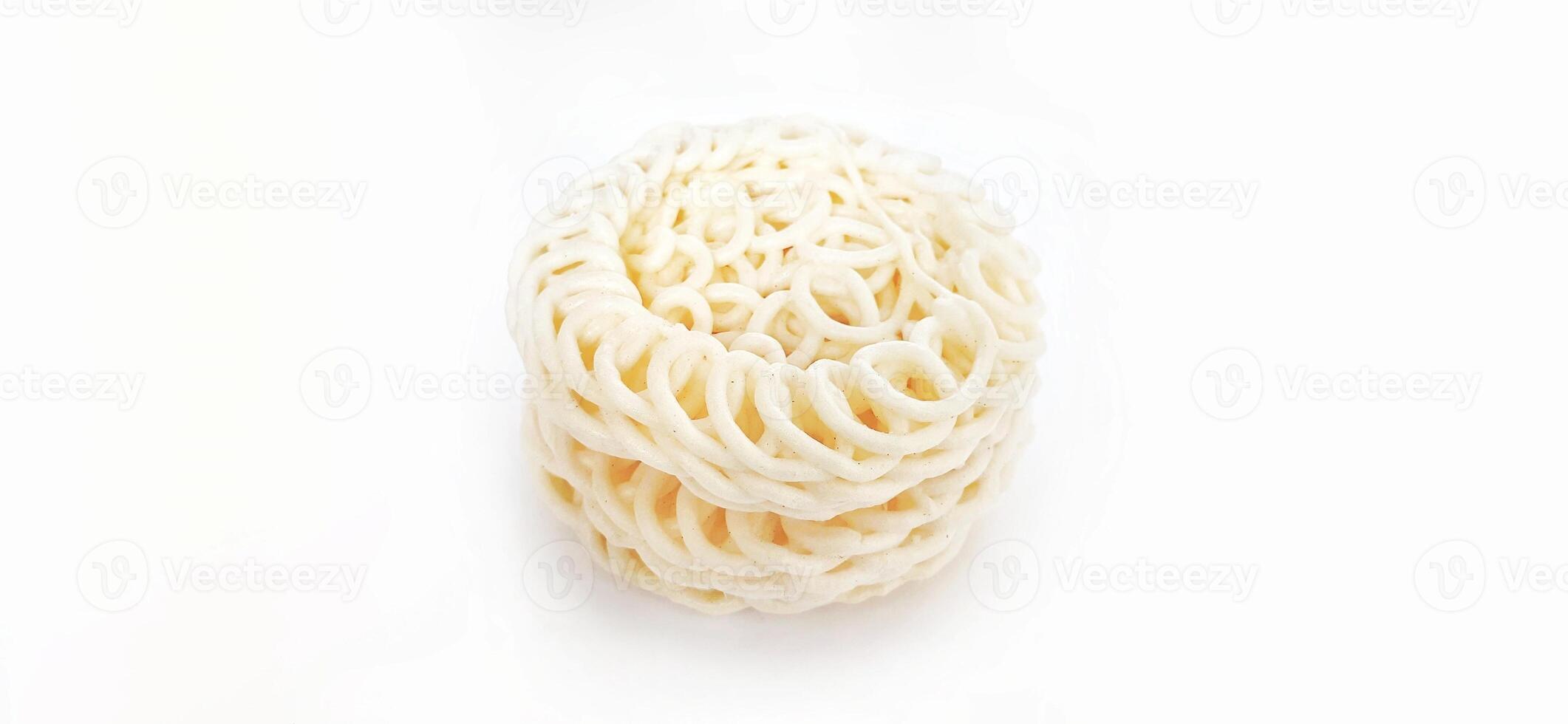 White noodle crackers or kerupuk putih or kerupuk warung made from tapioca flour, snack food from Indonesia isolated on white background photo