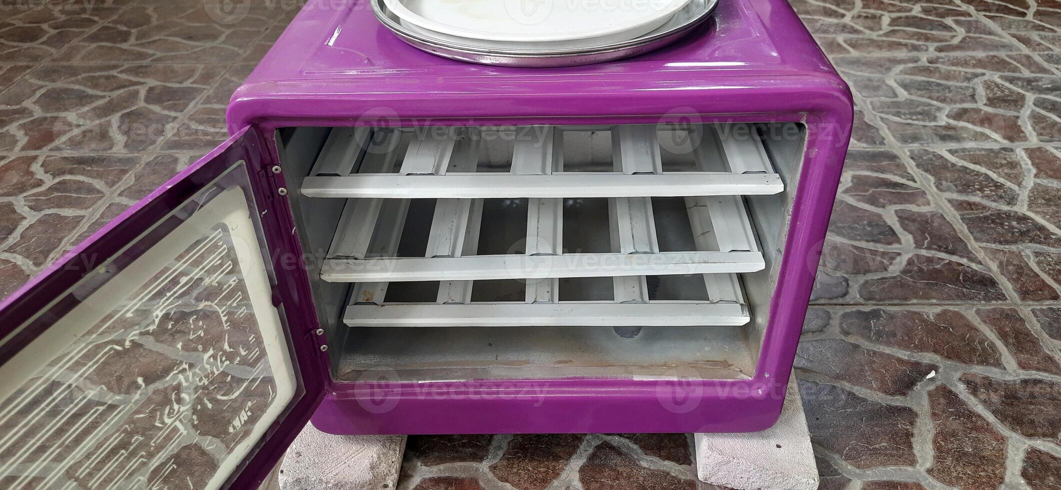 Oven cake flipper purple colors photo