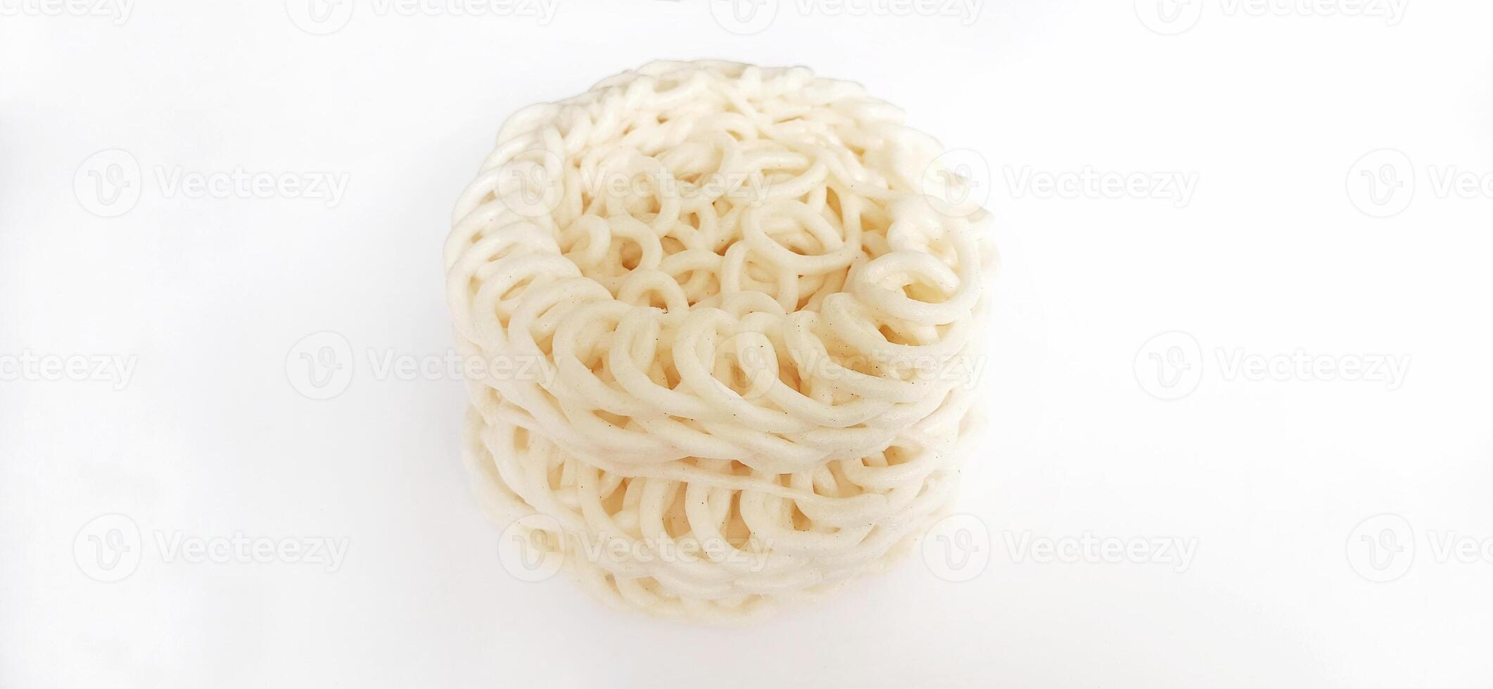 White noodle crackers or kerupuk putih or kerupuk warung made from tapioca flour, snack food from Indonesia isolated on white background photo