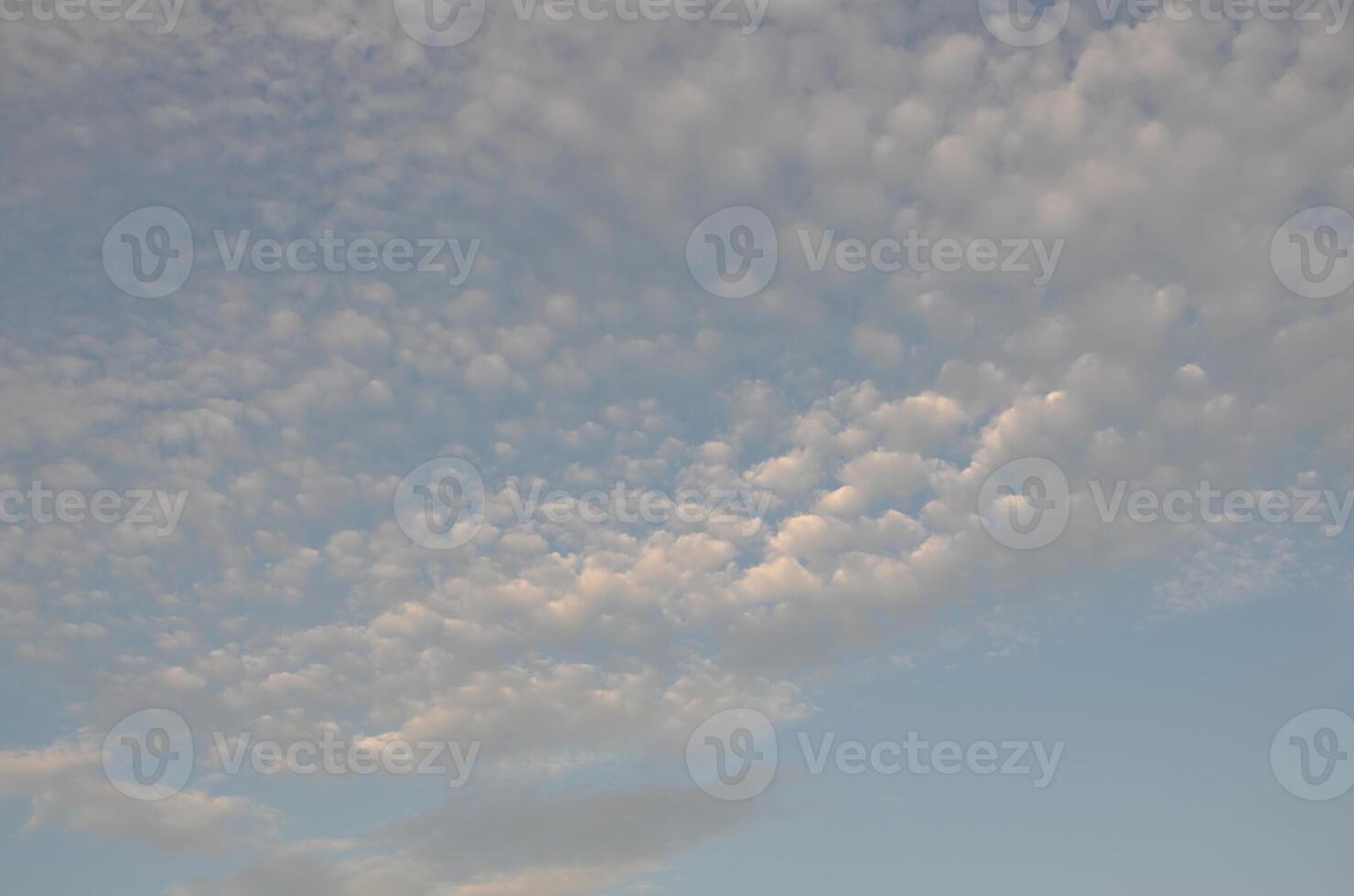 Blue sky with grey clouds photo