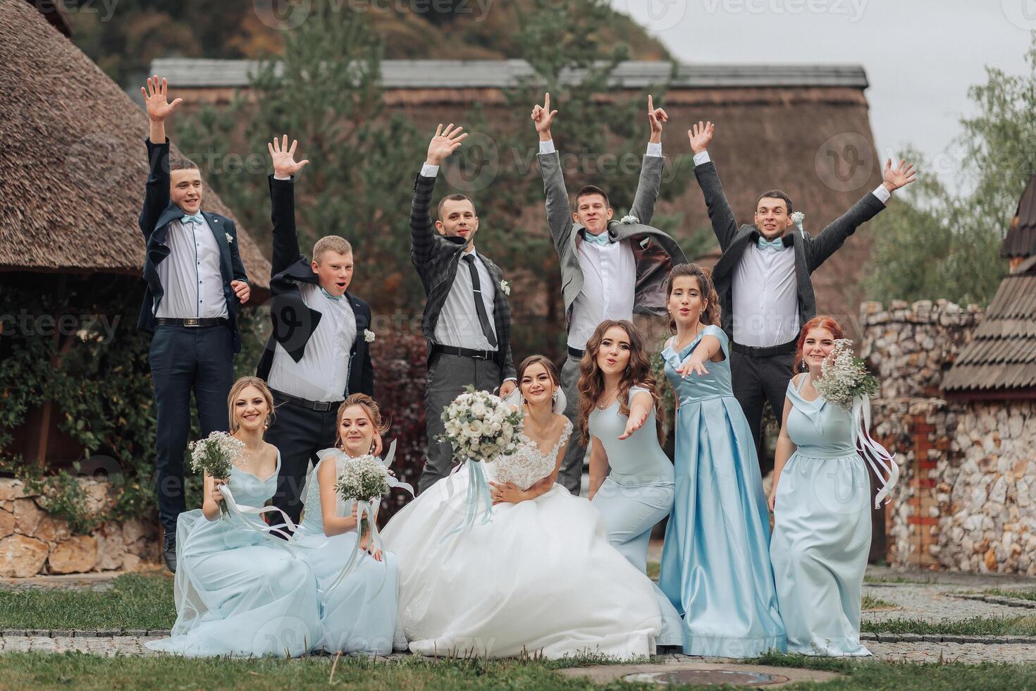 A group of people are posing for a picture, with a bride and groom in the center photo