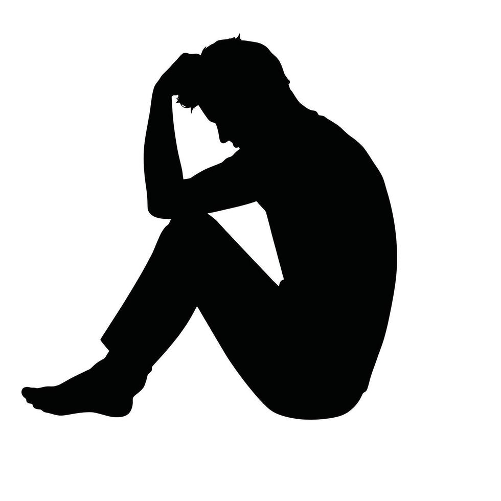 A silhouette of a man sitting down with his head in his hands vector