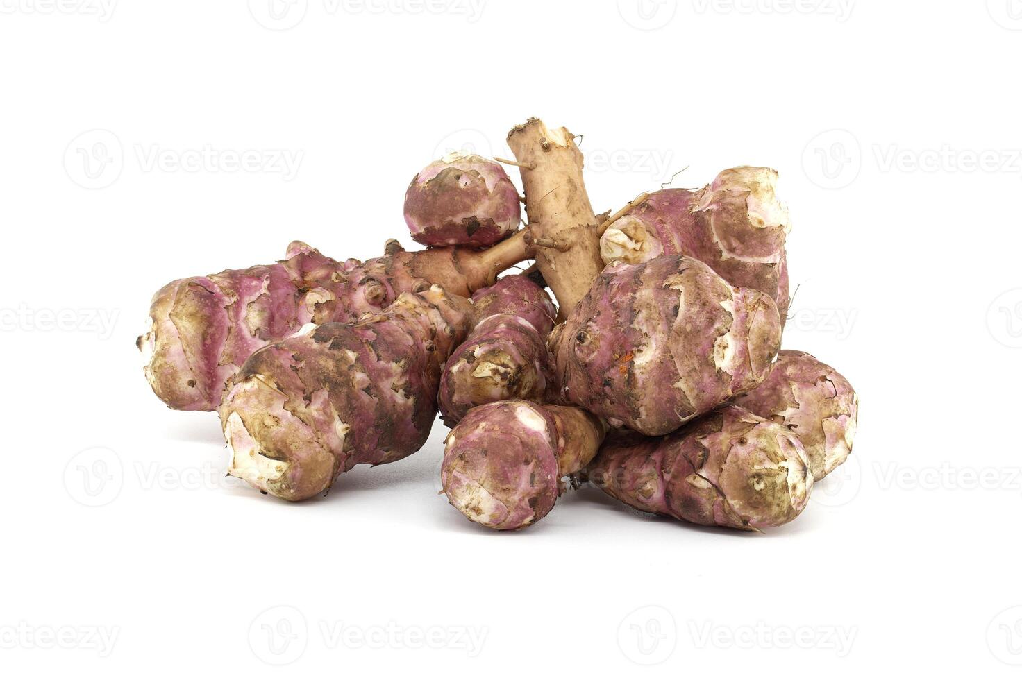Fresh raw Jerusalem artichokes isolated on white background photo