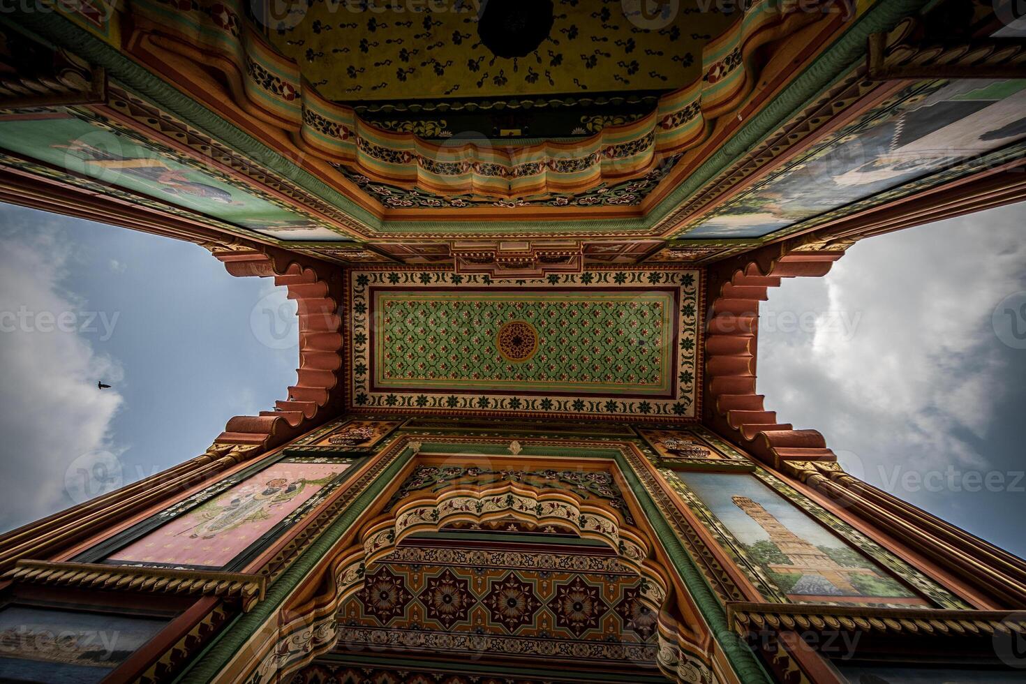 A view up at the ceiling of a building photo