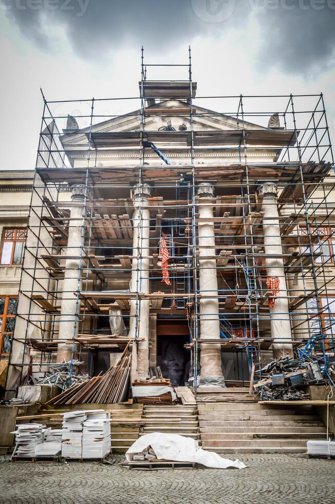 A large building with scaffolding around it photo