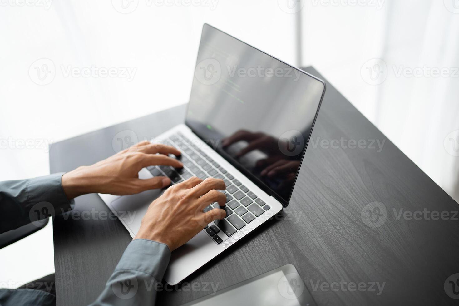 Business man working with laptop Hands typing keyboard. Professional investor working new start up project. business planning in office. Technology business.. photo