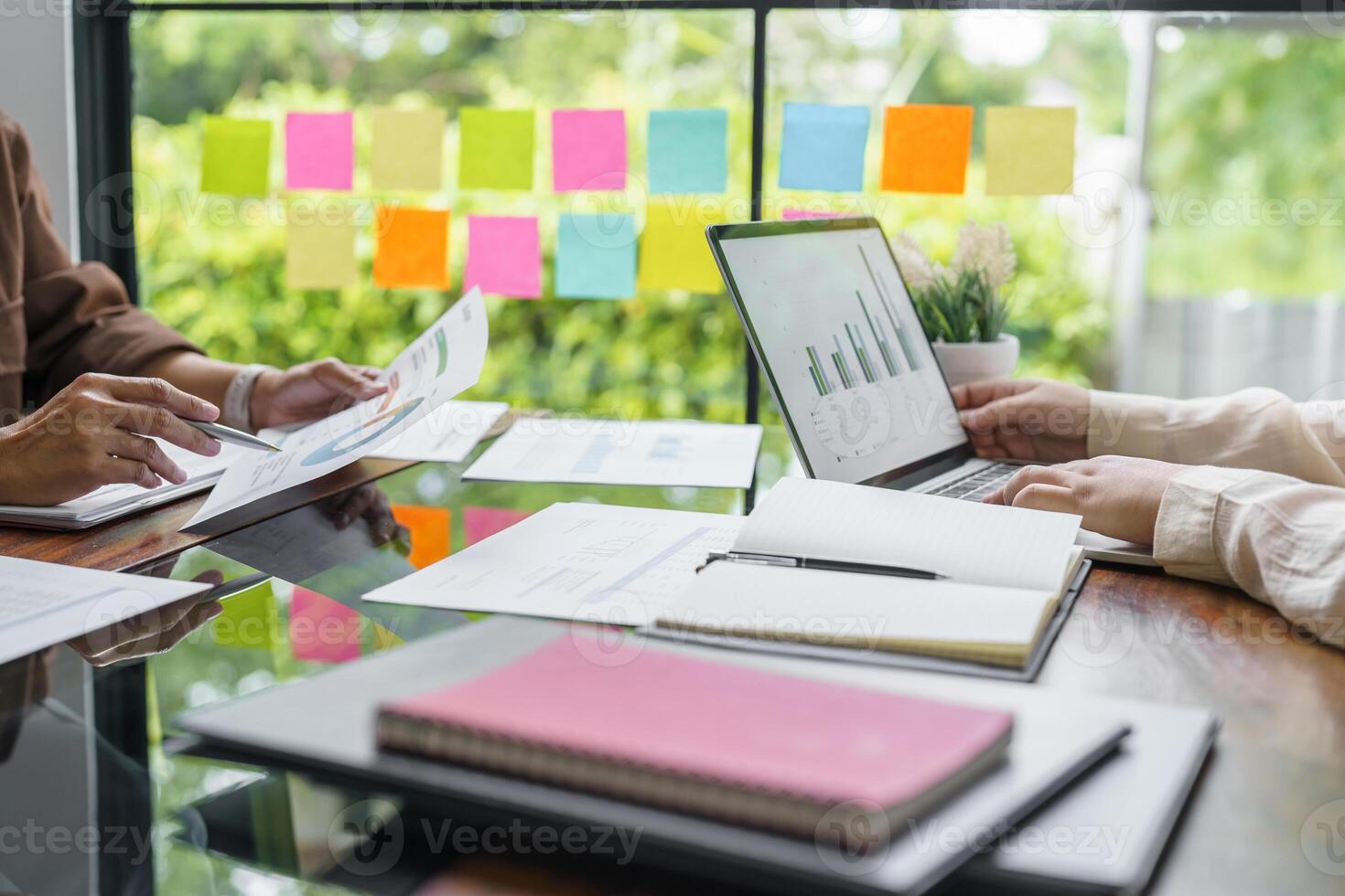 Business People brainstorming Meeting Design Ideas use post it notes to share idea professional investor start up project business brainstorming planning in office photo