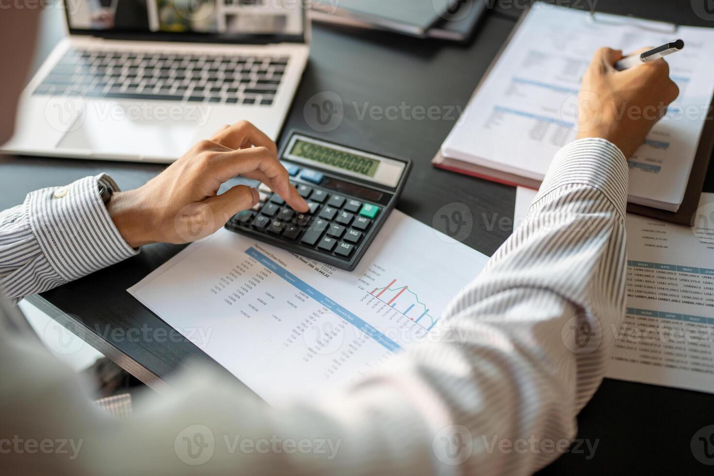 Auditor or internal revenue service staff, Business men checking annual financial statements of company. Audit Concept. photo