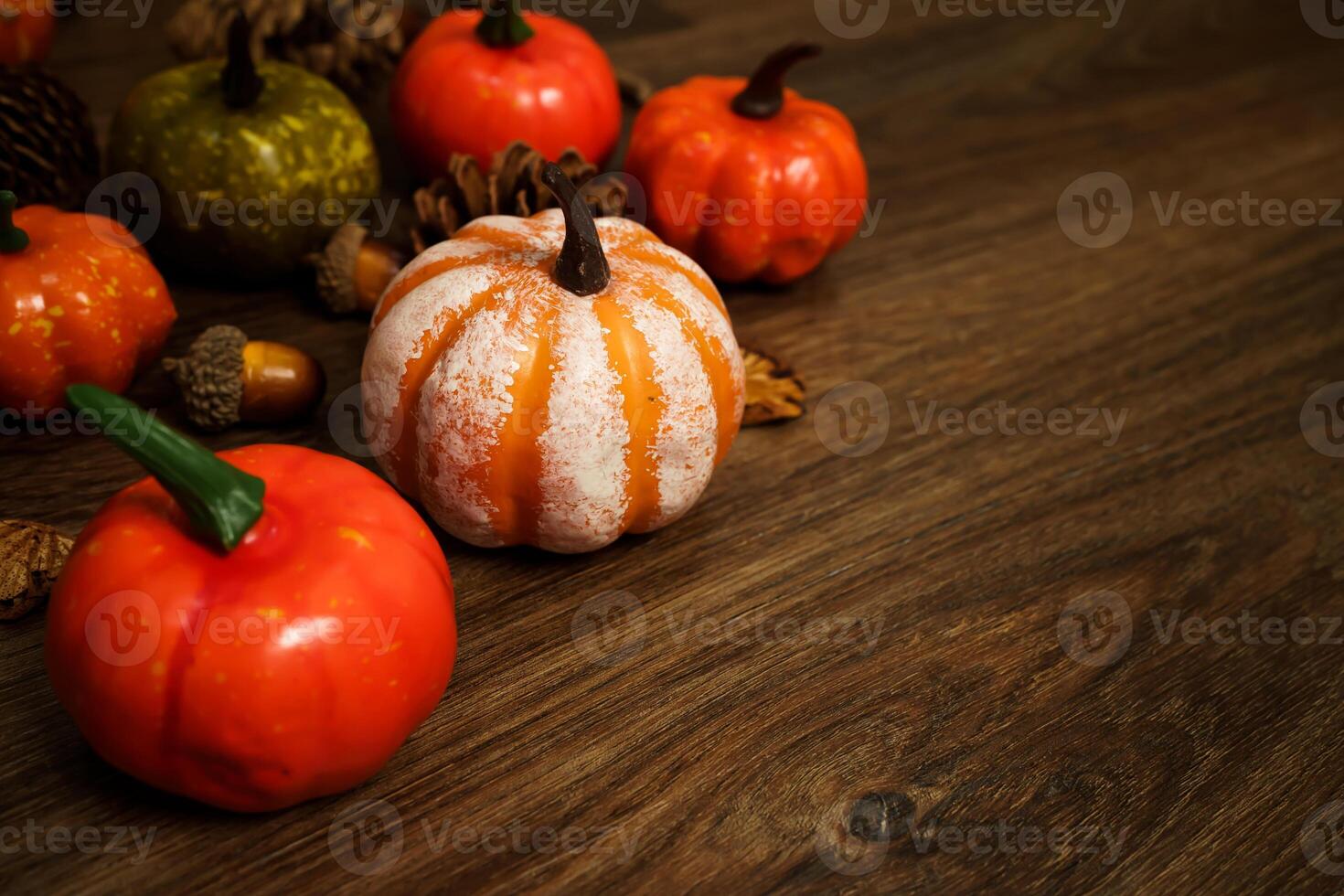 Halloween decorations background. Halloween Scary pumpkin head on wooden table Halloween holiday concept photo