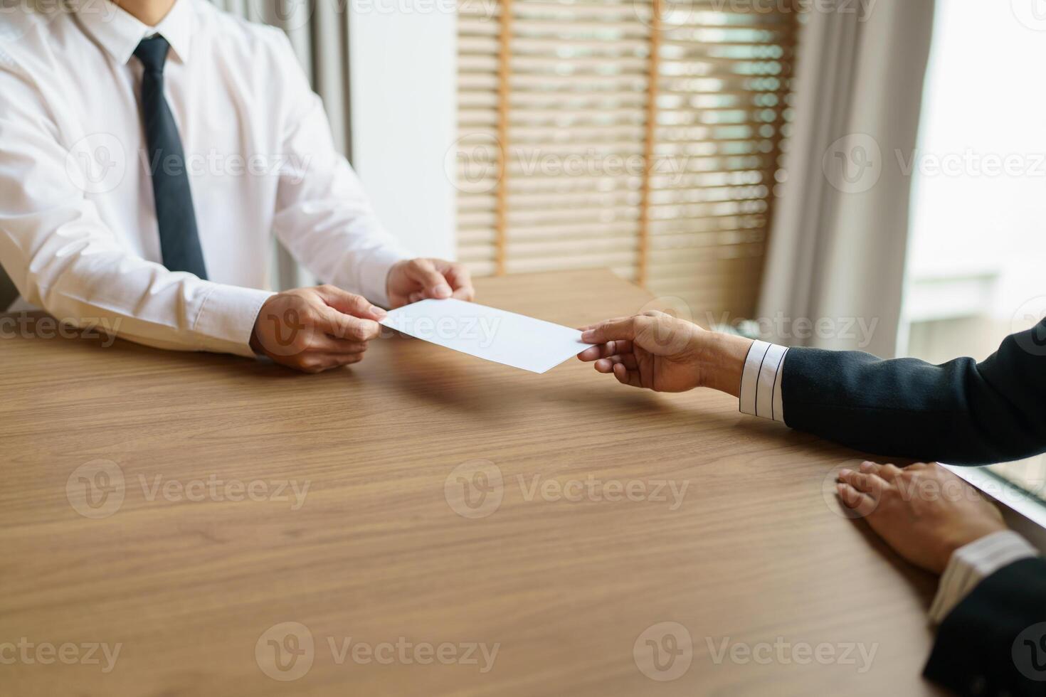 Quit Job Business man sending resignation letter and packing Stuff Resign Depress or carrying business cardboard box in office. Change of job or fired from company. photo