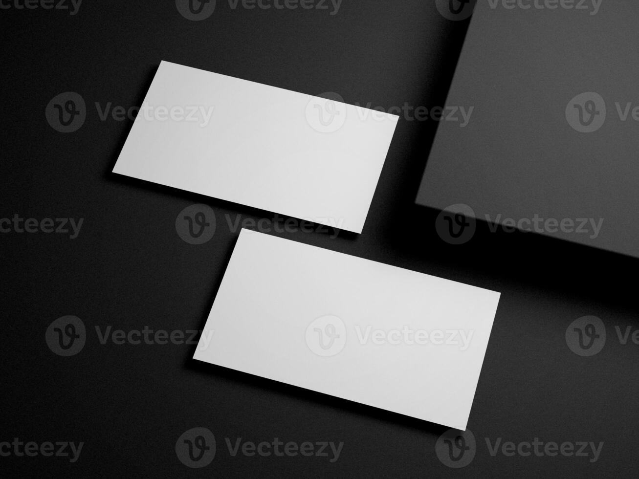 Business card on black background photo