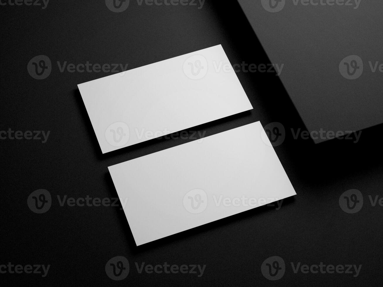 Business card on black background photo