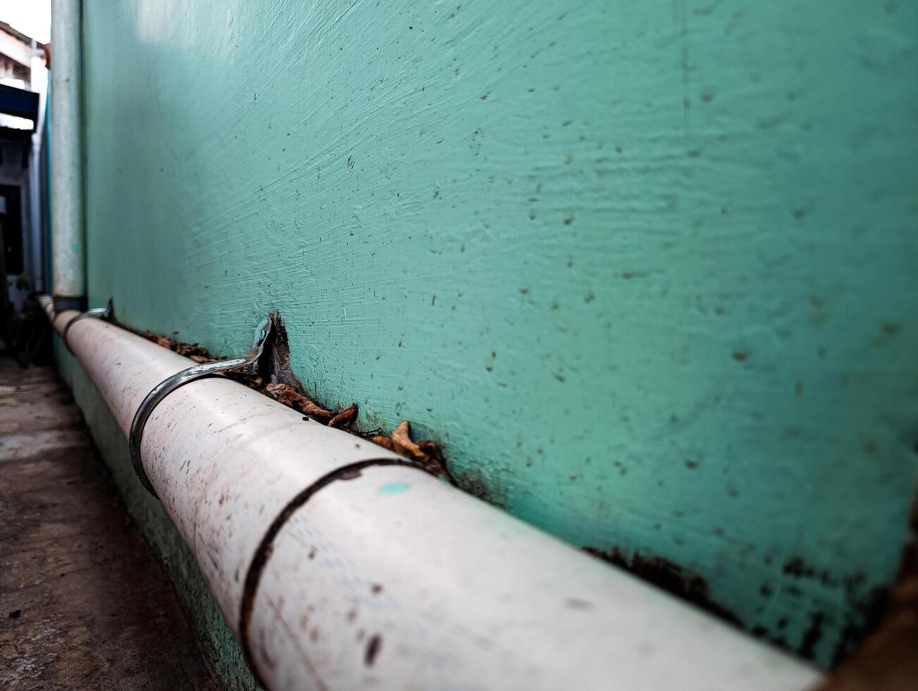 Long white pipe for rainwater drainage photo