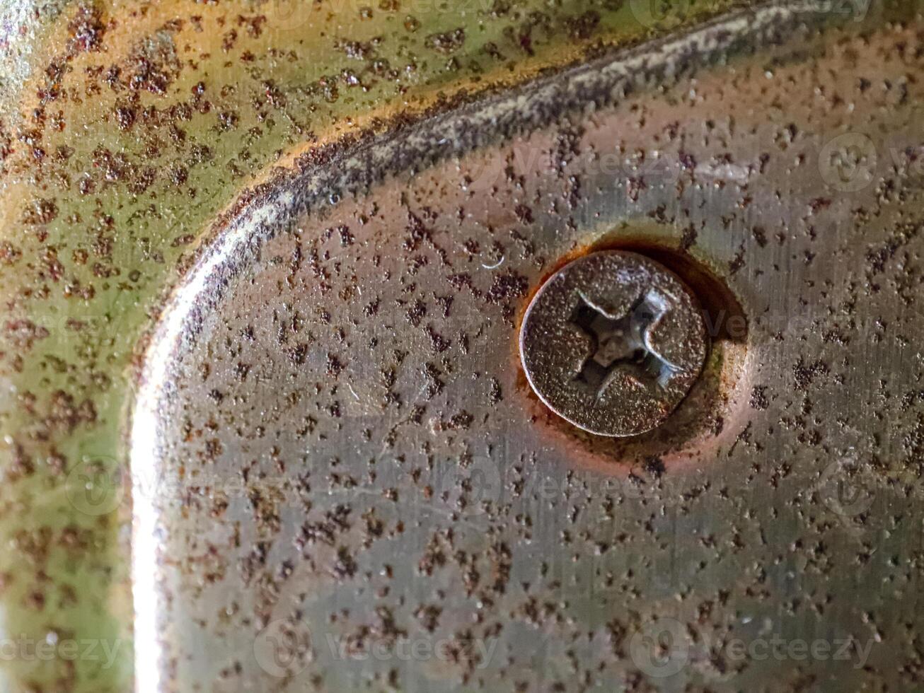 close up of rusty screw head photo