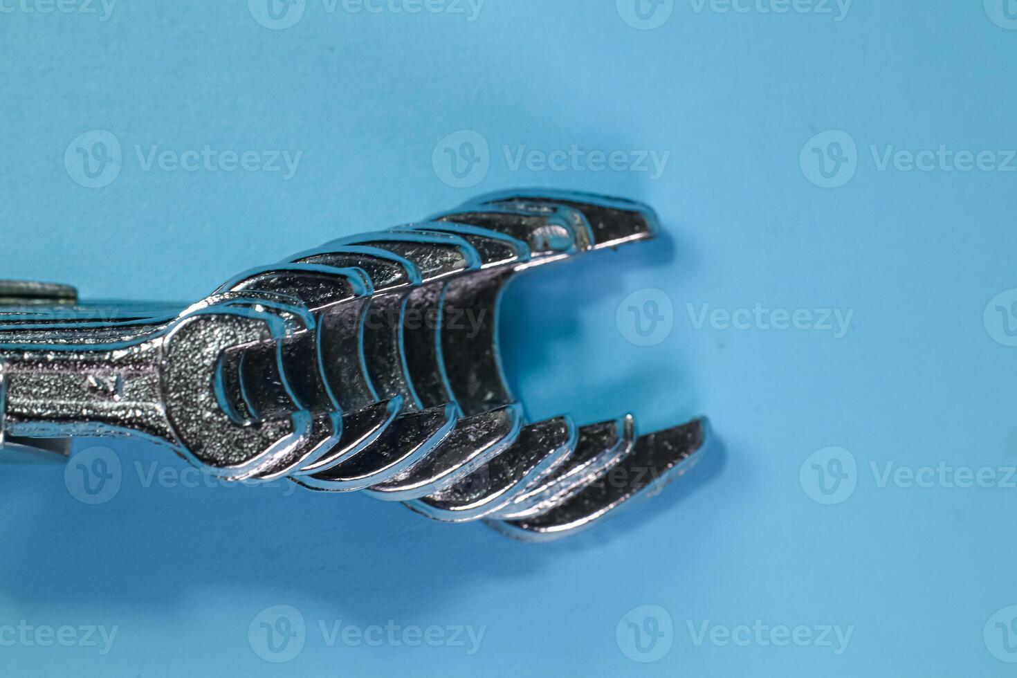 wrench heads arranged on a blue background photo