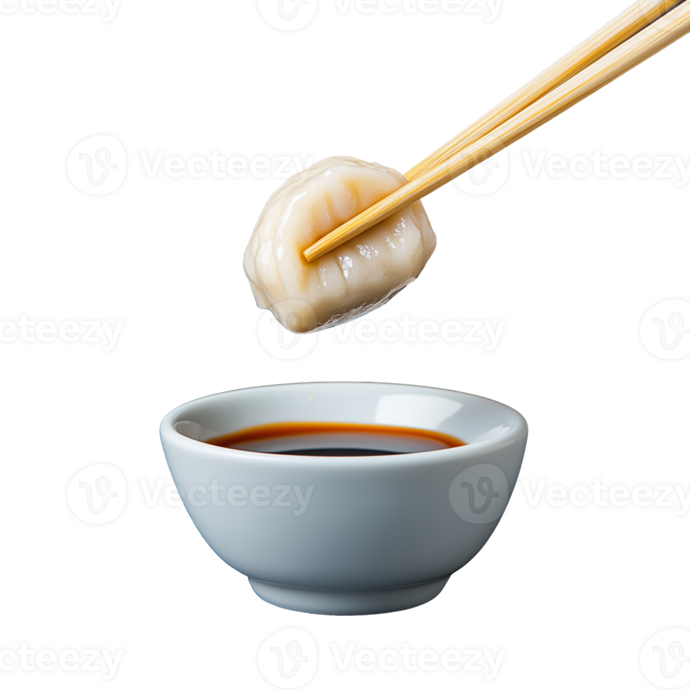 Dumpling with chopsticks over soy sauce bowl png