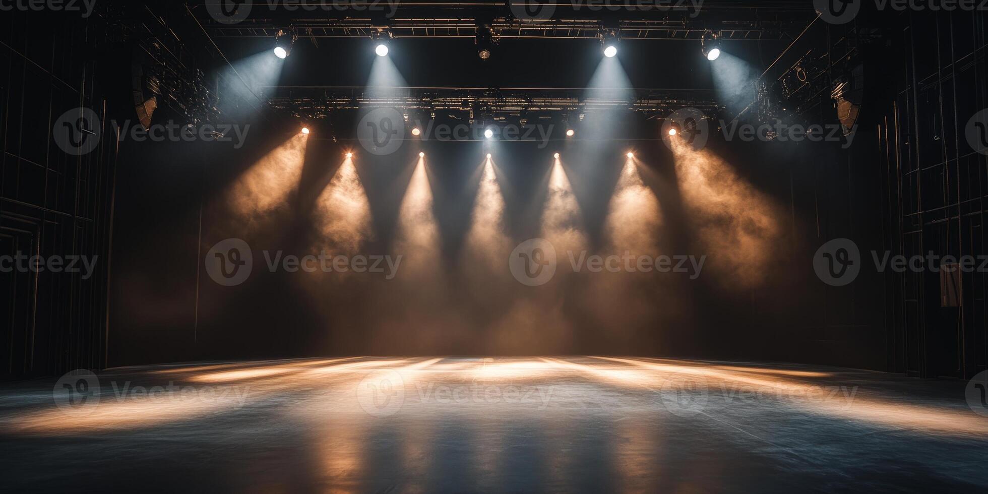A spectacular lighting design with many spotlights illuminating the stage floor adorns an empty theater stage. A dark background sets the mood and draws attention to the stage area photo