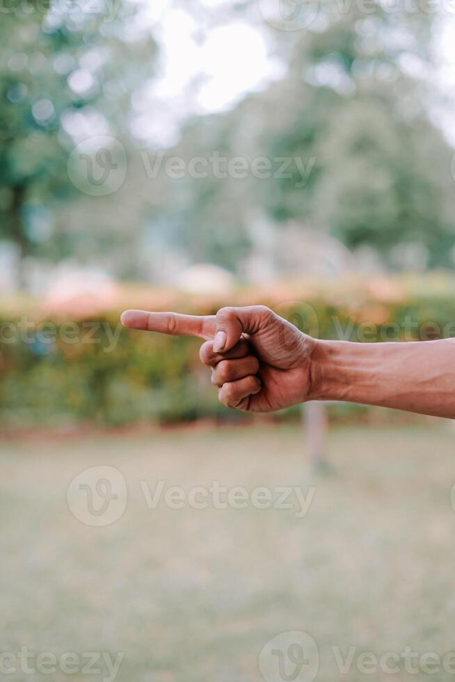hand fingers displaying various symbols and number or gestures photo