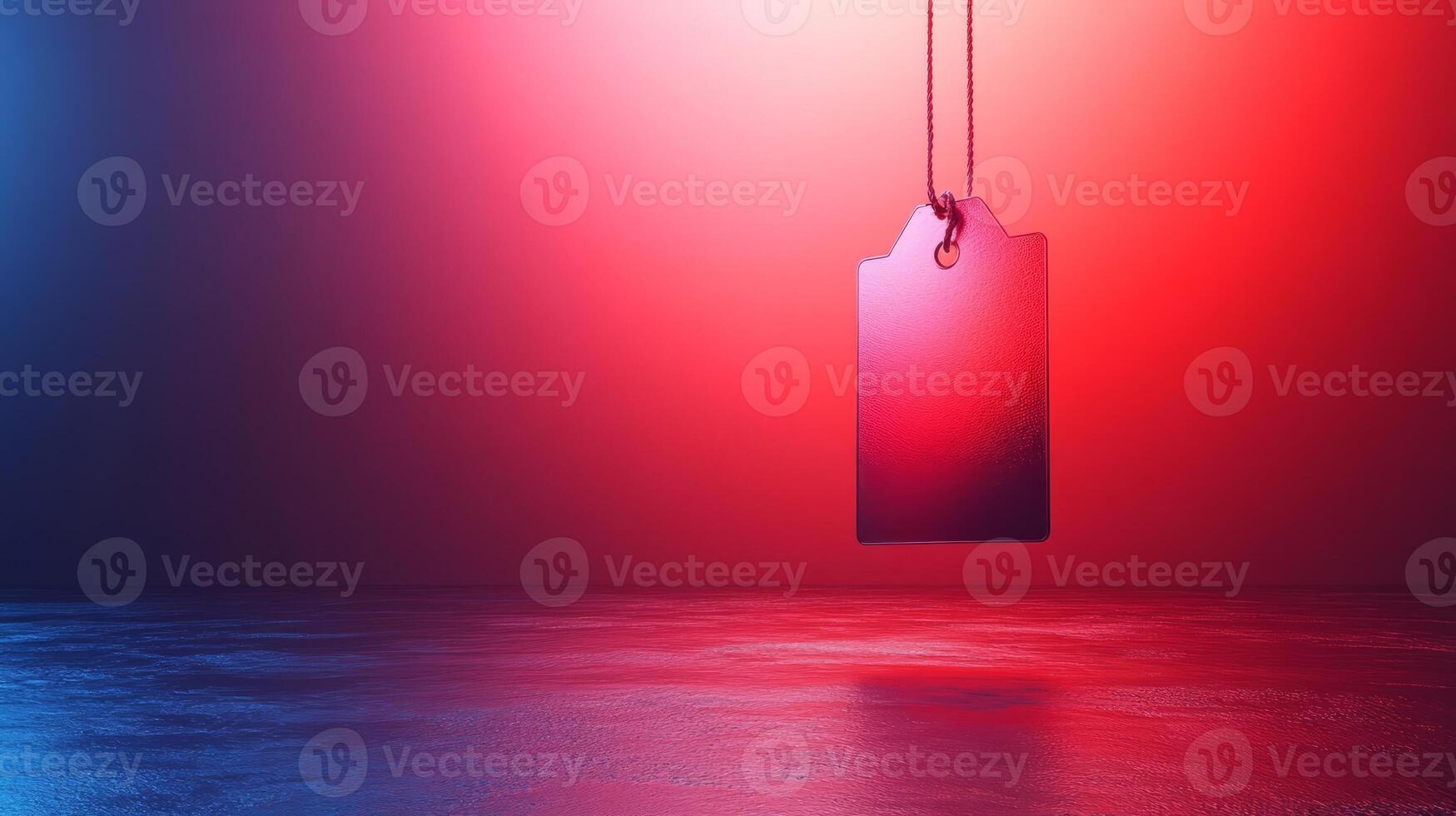 A red and blue price tag hanging from a string photo