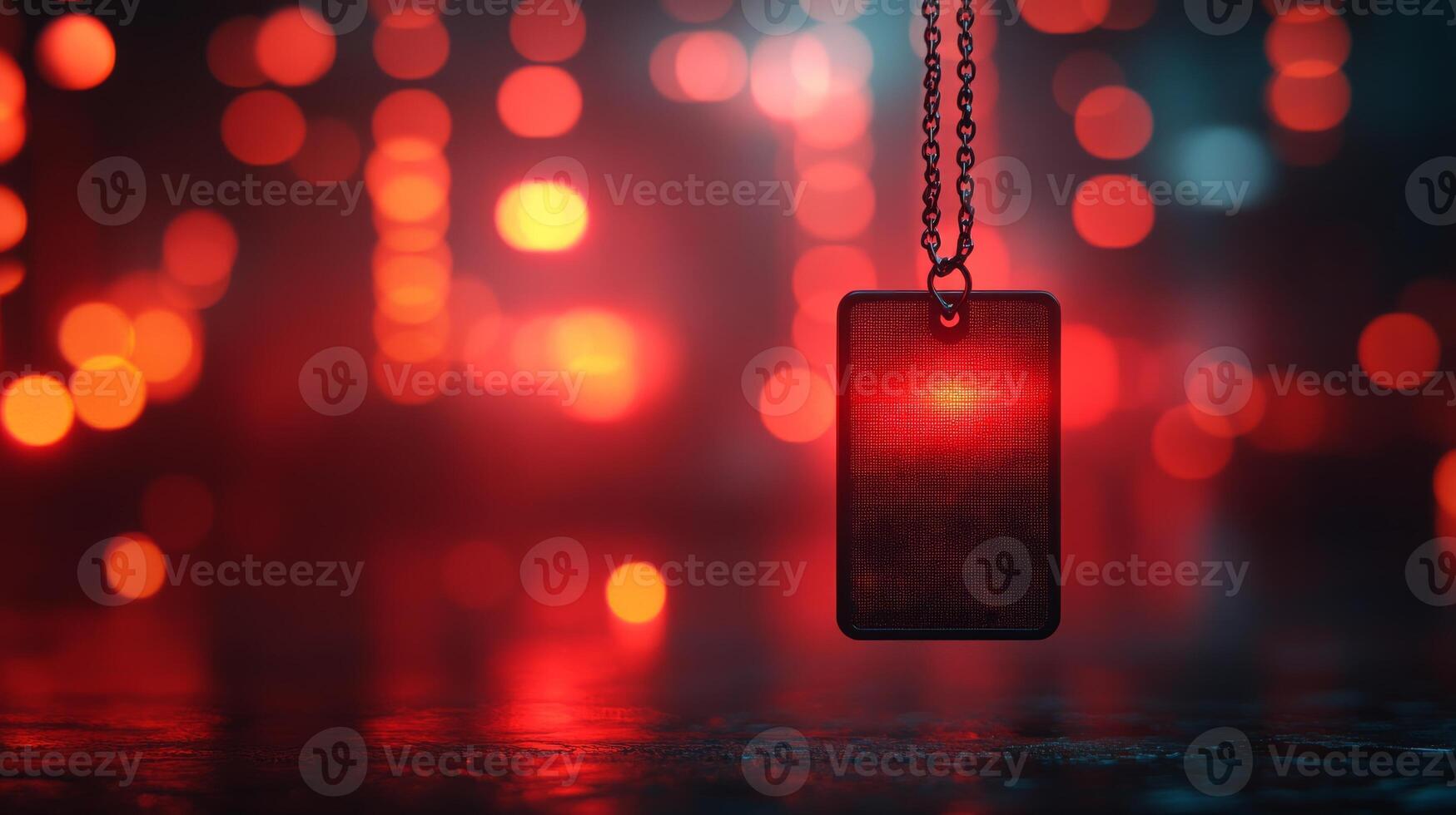 A red light is shining on a black object photo