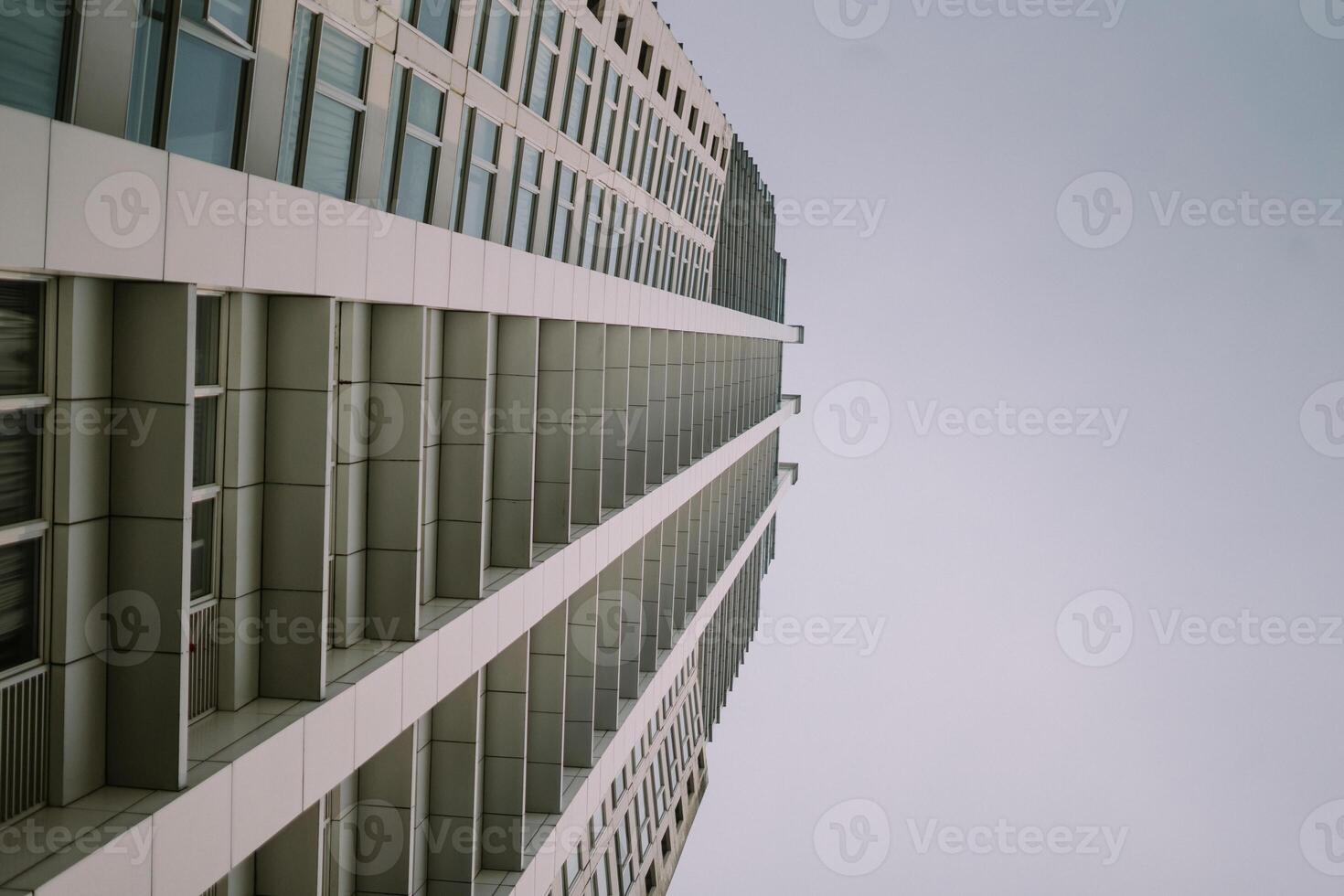 A tall hotel building standing majestically against the skyline photo