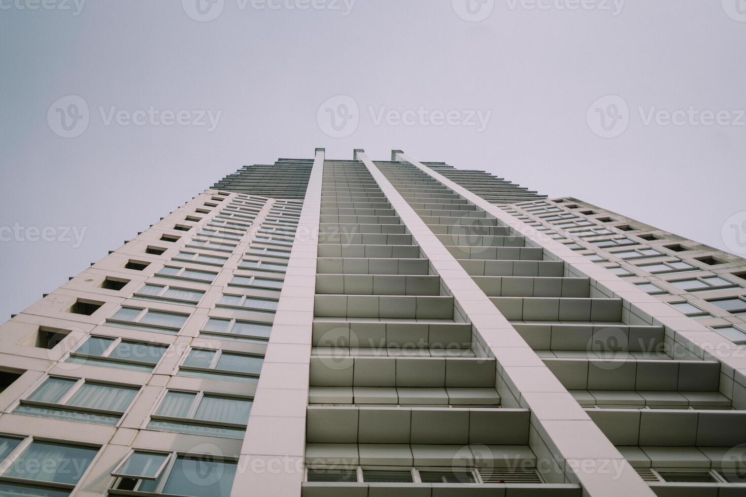 A tall hotel building standing majestically against the skyline photo