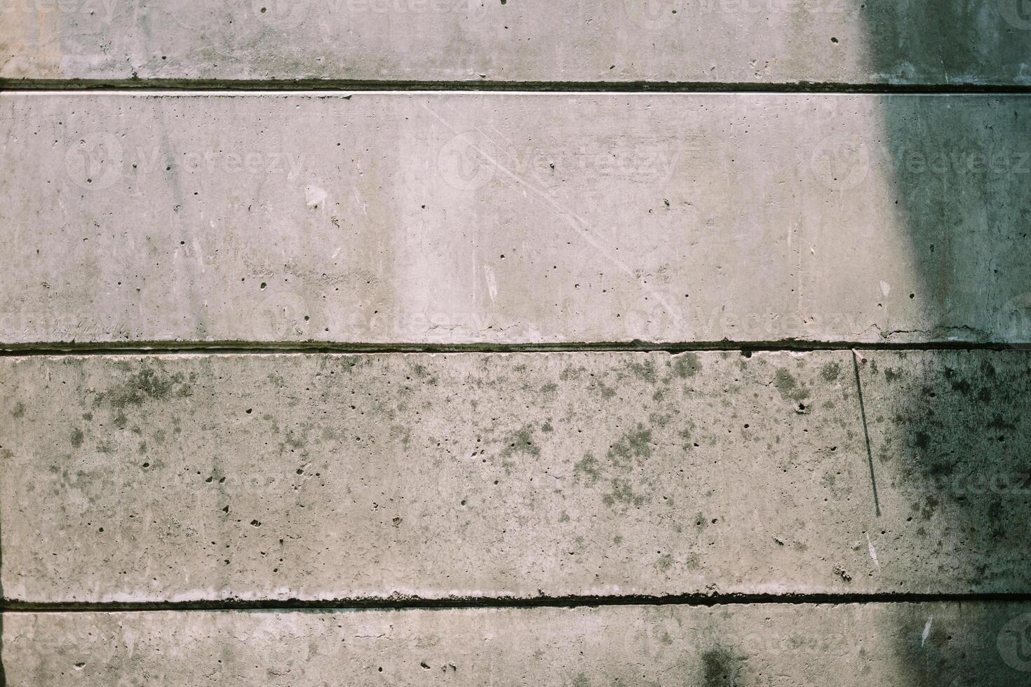 Boundary wall separating an upscale residential complex from a neighboring village area photo