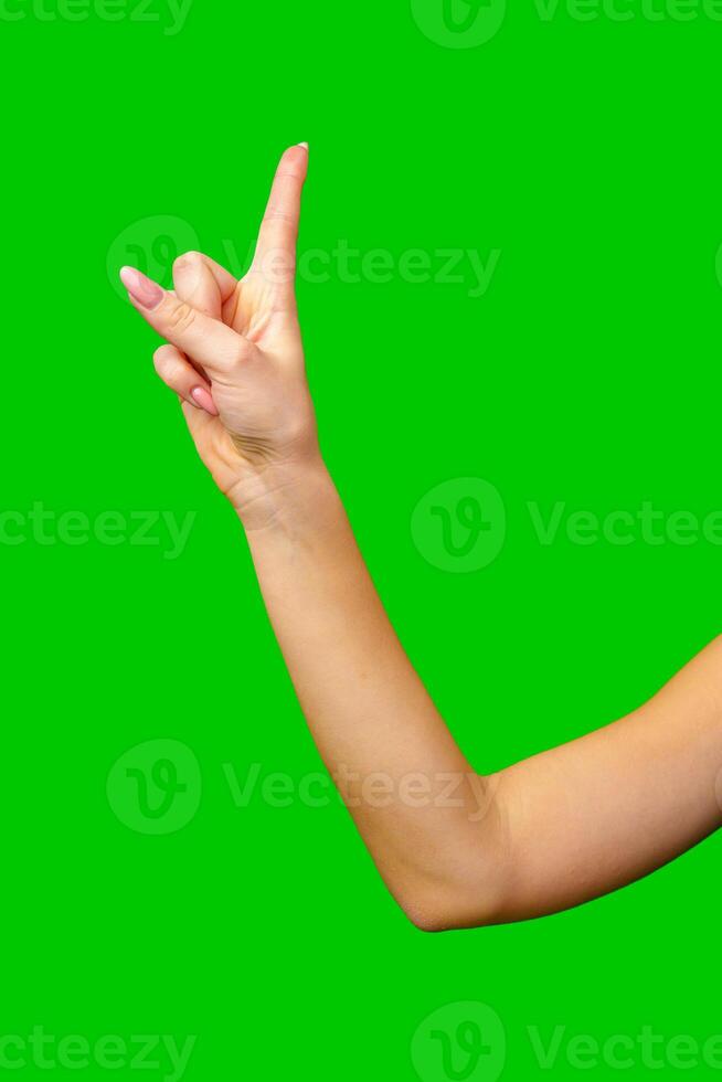 Woman Holding Out Hand on Green Screen photo