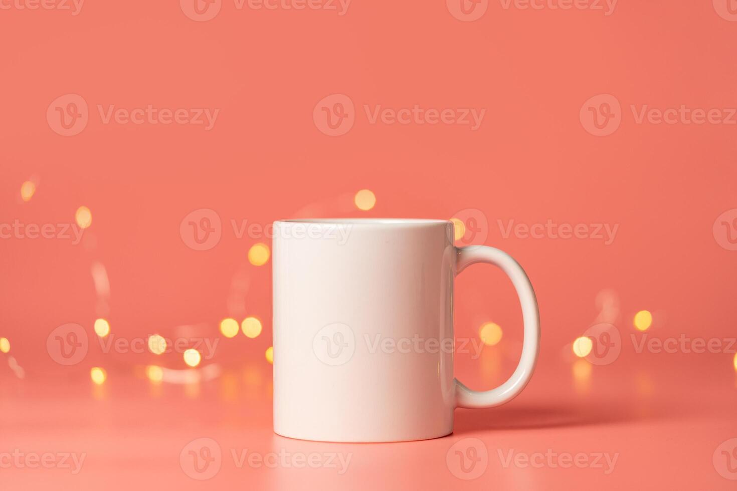 Ceramic mug mock up on pink background studio shot photo